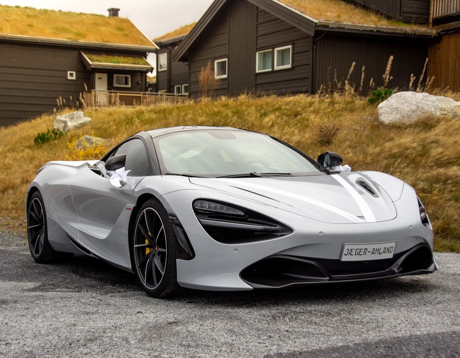 Silver sports car parked safely outside a cosy lodge, evoking a calm home for your vehicle